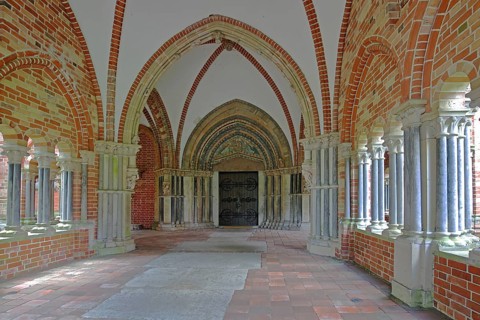 Paradise with columns and portal of the Gothic cathedral, vestibule, vault, brick church, Old Town,
