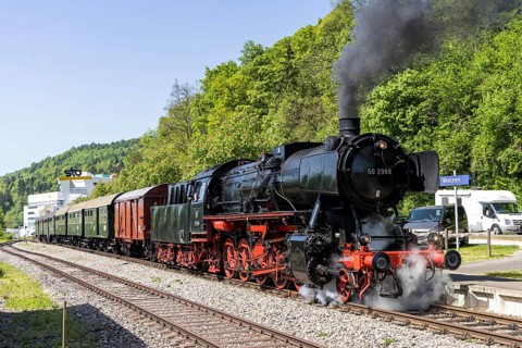 Steam train of the Sauschwänzlebahn steam railway railway steam locomotive at Weizen station,