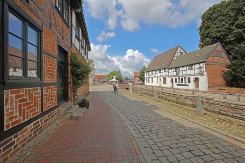 Historic half-timbered houses and canal pit, brick building, Frische Grube, Wismar,
