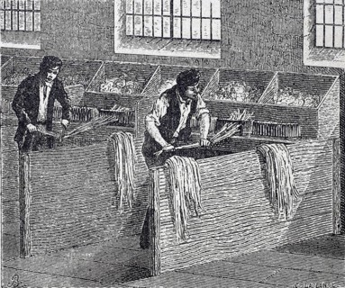 Textile industry, spinning mill, men working on a hand hackle, tool made of wood or metal with