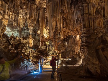 Cueva de Nerja, illuminated cave, large stalagmites and stalagtites, Nerja, Andalusia, Spain