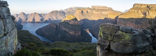 Panorama, sunset at Blyde River Canyon with Three Rondawels peak, view of canyon with Blyde River