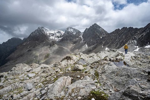 Mountaineer, Small mountain lakes in rocky mountain landscape, Niedere Gradenscharte, summit of