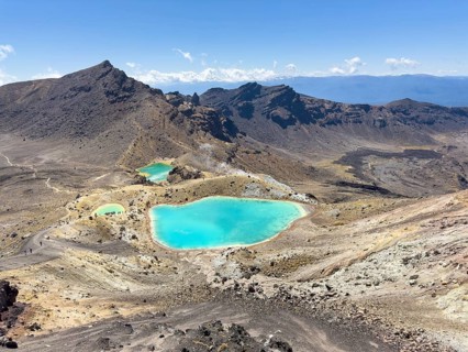 On the hiking trail of the Tongariro Alpine Crossing in Tongariro National Park with a view of the