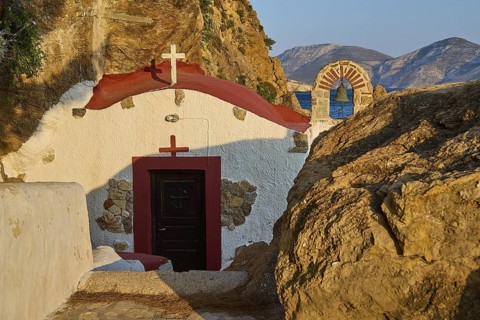 Legend, crab, shell fisherman, rock embedded chapel with view of the sea and mountains in the