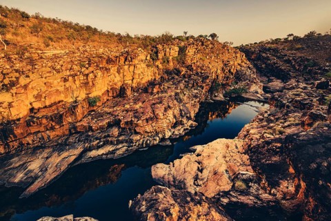 Bell Gorge waterfall, a body of water in north-west Australia in the Kimberley. Sunrise in the