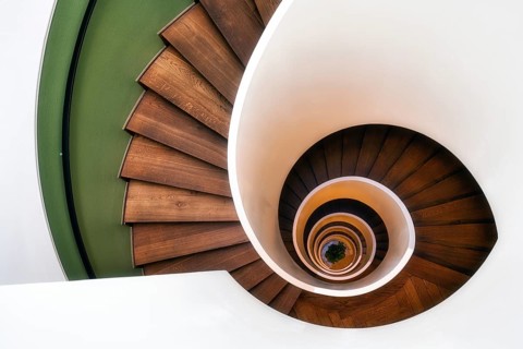 Spiral staircase with wooden steps, old staircase, Zurich, Switzerland