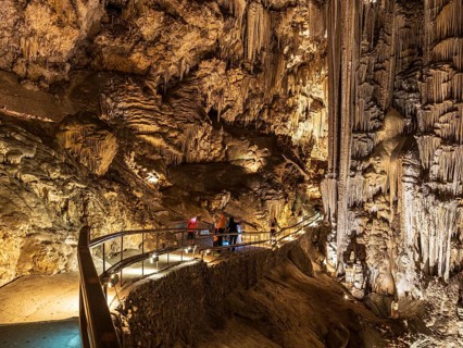 Cueva de Nerja, illuminated cave, large stalagmites and stalagtites, Nerja, Andalusia, Spain