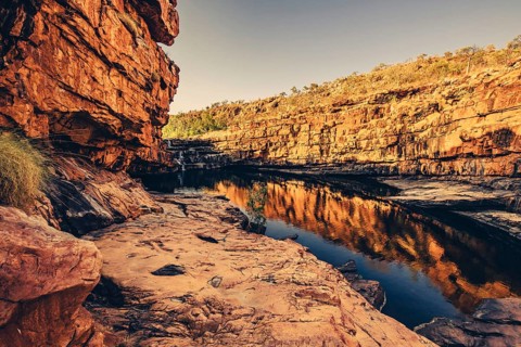 Bell Gorge waterfall, a body of water in north-west Australia in the Kimberley. Sunrise in the