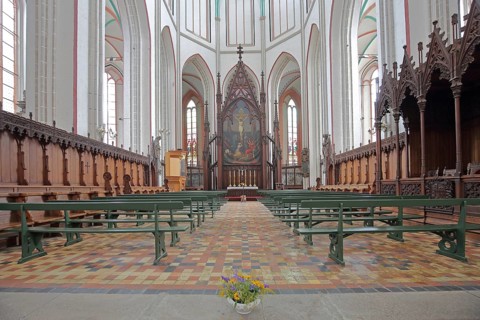 Chancel with paintings and choir stalls, Gothic UNESCO Cathedral of St Mary and St John, interior