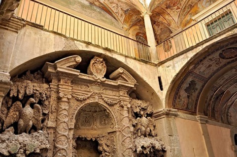 Ornamental fountain from the Renaissance, fountain with moss and artificial dripstone from the