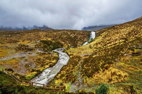 Eas a' Bhradain waterfall, Red Cuillin mountains, Loch Ainort, Isle of Skye, Scotland, UK