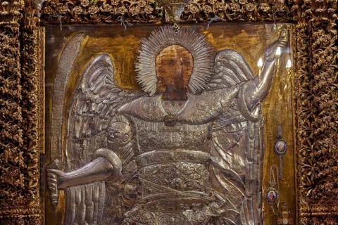 Archangel Michael, detailed icon of an angel with a sword, decorated with golden elements and a