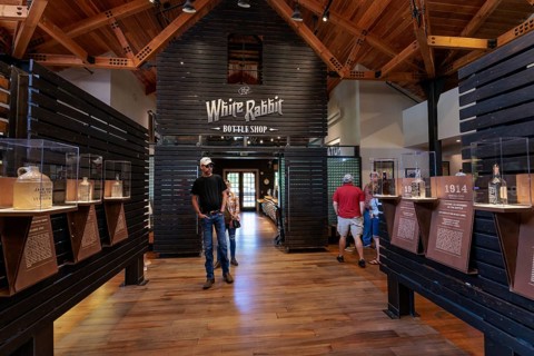 Visitors looking at display in the museum of the Jack Daniel Distillery in Lynchburg, Tennessee