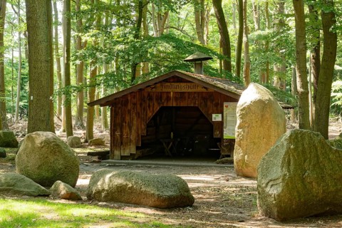 Erratic blocks and hut in the Neuenknick erratic block forest in the Teutoburg Forest. Around 2000