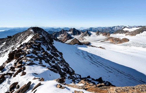 Snow on the Wilder Freiger mountain peak, picturesque high mountain landscape, view of