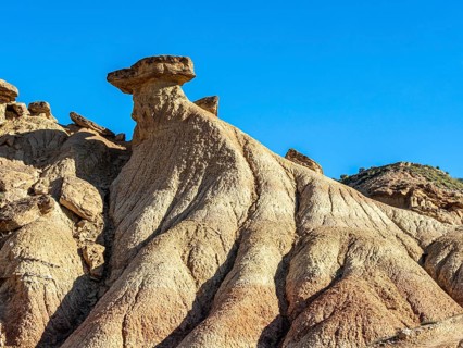 Colorful rock formation, semi-desert, Bardena Blanca area, Bardenas Reales Nature Park, Navarre,
