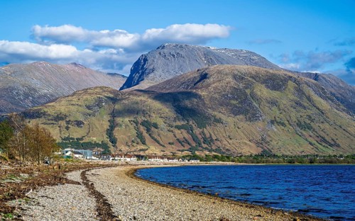 View of Caol Beach and Nevis Range Mountains, Corpach, Fort William, Highland, Scotland, UK