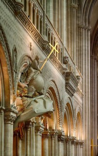 Interior view, angel on pulpit, holding a shining golden sword, Cathédrale Notre-Dame de Bayeux,