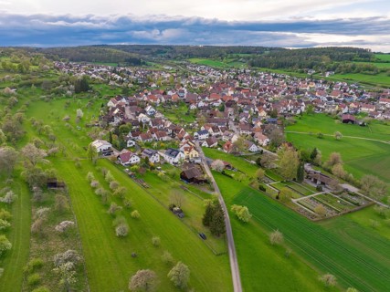 Picturesque view of a traditional village, embedded in extensive nature and gardens, Ostelsheim,