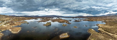 Panorama of Rannoch Moor from a drone over Loch Ba and Loch of the Armpit, A82 Highland Way, Argyll
