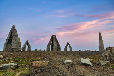 Arctic Henge, large stone gates, basalt, landmark in barren landscape, Heimskautsgerði,