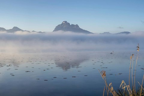 Sunrise at Lake Hopfensee near Füssen, with the Tegelberg massif and the Säuling behind it,