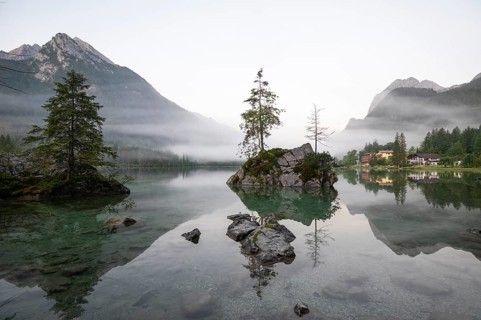 Magical sunrise with fog at Hintersee near Ramsau in Berchtesgadener Land