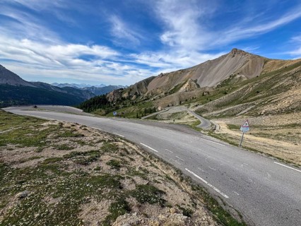 Northern ascent mountain road alpine road with serpentines above tree line shortly in front of pass