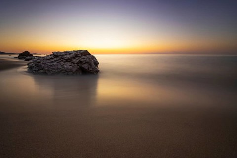 The sun rises on the Costa Rei, a stretch of coastline on the Italian Mediterranean island of