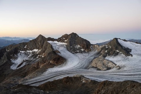 High mountain landscape at sunrise, glacier and rocky mountain peaks, view of the Königshofspitz