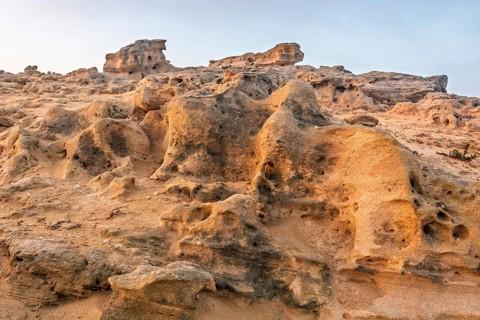 A rocky area with a hole in the ground. Rabat, Morocco