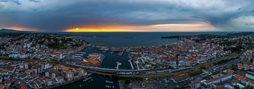 Panorama of Sunset over Saint-Jean-de-Luz from a drone, Nouvelle-Aquitaine, Pyrenees-Atlantiques,