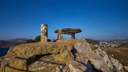 An abandoned concrete ruin on a rocky hill with a wide view over the landscape, Lost Place, Lago