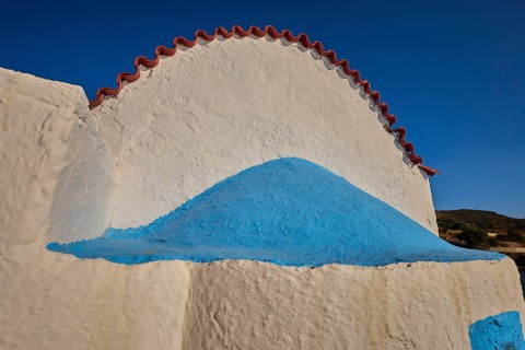 Close-up of a white church vault with blue accents under a blue sky, chapel, church, Agios