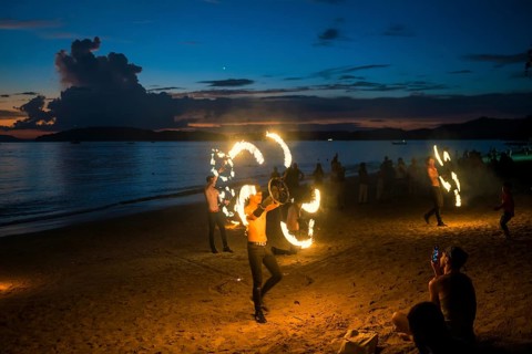 Fire show, jugglers with fire, Ao Nang Beach, sunset, Ao Nang, Krabi, Thailand