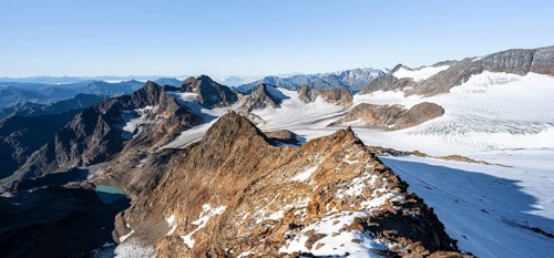Rocky ridge on the Wilder Freiger mountain peak, behind Signal summit and Becher summit with