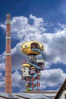 Chimney and tower of the Kuchlbauer brewery designed by Friedensreich Hunderwasser, Römerstr, 5-9,