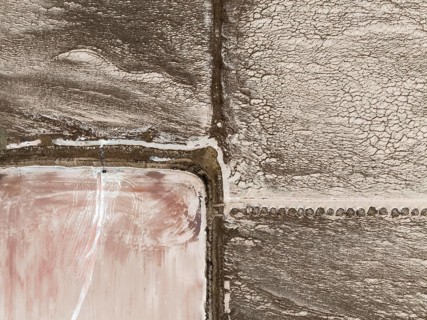 Saline ponds at the salt works of Walvis Bay. Aerial view. Drone shot. Namibia