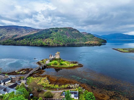 Eilean Donan Castle and Loch Duich from a drone, Isle of Skye, Highlands, Scotland, England, United