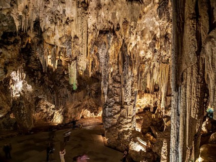 Cueva de Nerja, illuminated cave, large stalagmites and stalagtites, Nerja, Andalusia, Spain