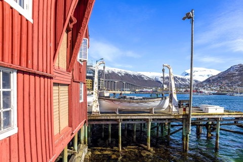 Norway, Tromso, famous tourist travel destination known for northern lights aurora borealis viewing
