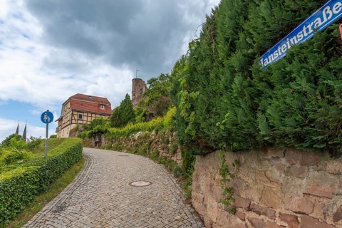 Path to the medieval Hanstein castle ruins, built on a red sandstone rock, Bornhagen, Eichsfeld