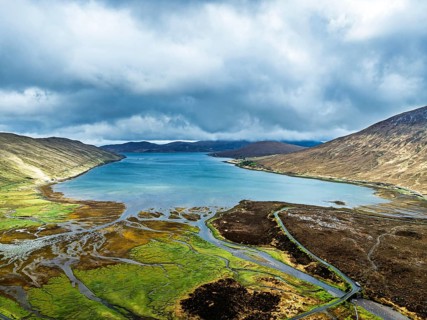 View from Eas a' Bhradain Waterfall from drone, Red Cuillin mountains, Loch Ainort, Isle of Skye,