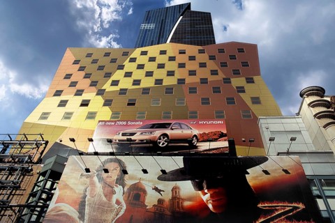 Billboard advertising on the facade of a high-rise building, New York City, USA