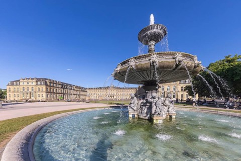Schlossplatz Stuttgart with New Palace and fountain with fountain bowl. Place of interest in