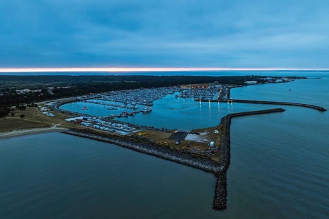 Sunset over Marina in Le Verdon-sur-Mer from a drone, Nouvelle-Aquitaine, Gironde, France, EuropeLe