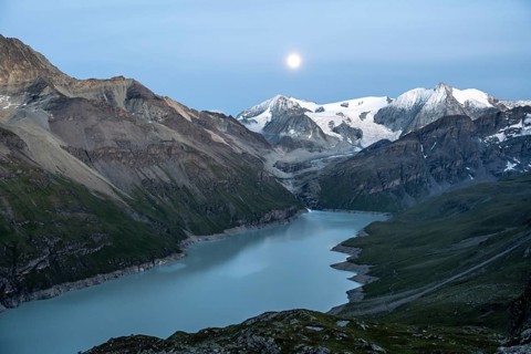 Mountain landscape with turquoise blue reservoir Lac des Dix and summit Mont Blanc de Cheilon,