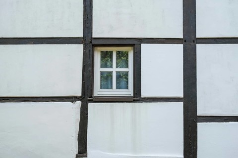 Stable window in a half-timbered barn, Münsterland, North Rhine-Westphalia, Germany