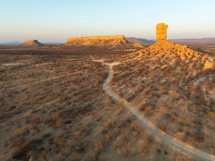 The Vingerklip (rock finger) and the Ugab Valley Terraces are surrounded by thornbush and mopane